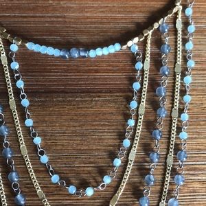 Pale blue beaded necklace.